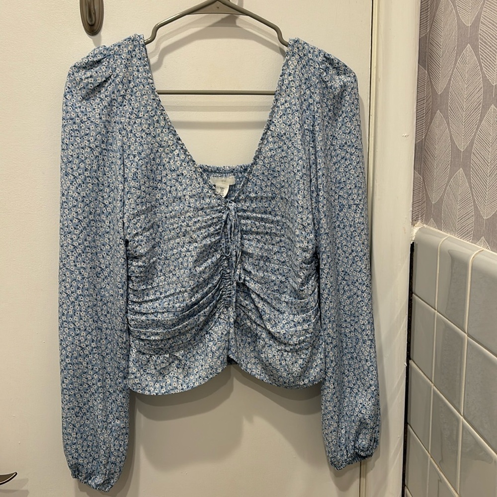 H&M blouse in size S (runs big). Worn a few times but in good condition.